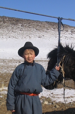 Mongolian boy with horse