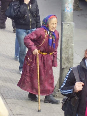 Old lady in traditional Mongolian clothes