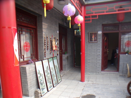 Narrow entryway to hutong courtyard