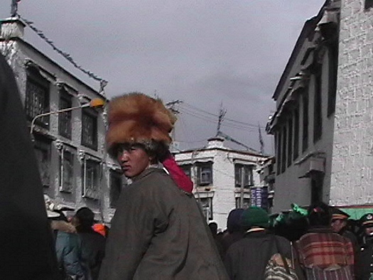 Tall fur hat in Lhasa