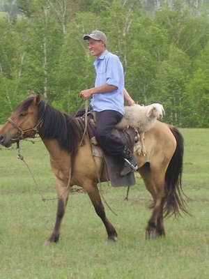 Grinning Mongolian cowboy