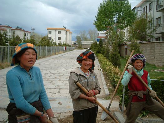 Young Tibetan women ditch-diggers