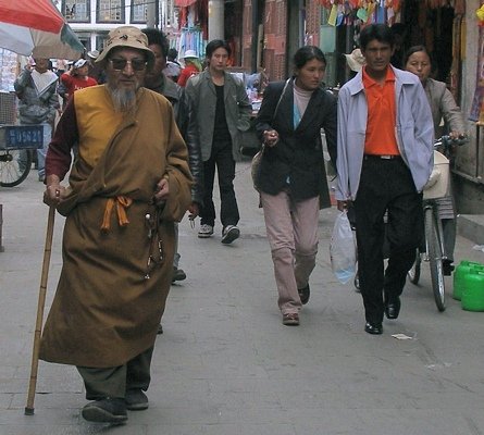 Old and young Tibetans walk the Barkor